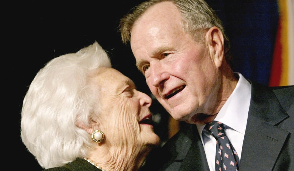Former US president George H.W. Bush speaks with his wife Barbara as their son, Florida Republican gubernatorial candidate Jeb Bush, celebrates victory at his election night party in Miami on November 5, 2002. Barbara Bush died on Tuesday at the age of 92, her family said. Photo: Reuters