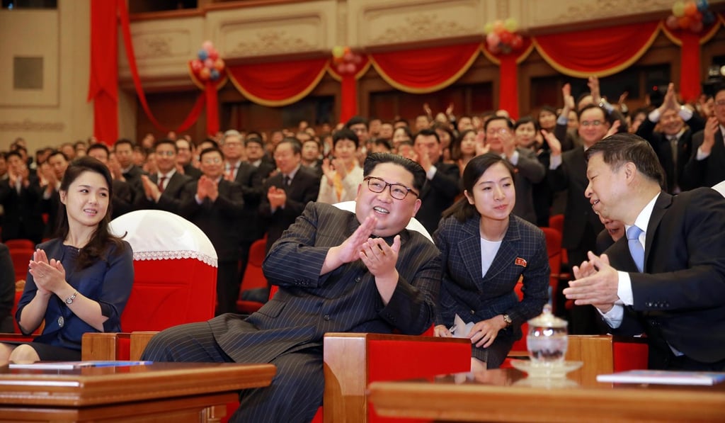 North Korean leader Kim Jong-un (centre), and wife Ri Sol-ju (left), watch the ballet choreodrama ‘Red Women Company’ performed by a Chinese art troupe at the East Pyongyang Grand Theatre in Pyongyang, North Korea, on Monday. Photo: KCNA via EPA-EFE North Korean leader Kim Jong-un (centre), and wife Ri Sol-ju (left), watch the ballet choreodrama ‘Red Women Company’ performed by a Chinese art troupe at the East Pyongyang Grand Theatre in Pyongyang, North Korea, on Monday. Photo: KCNA via EPA-EFE