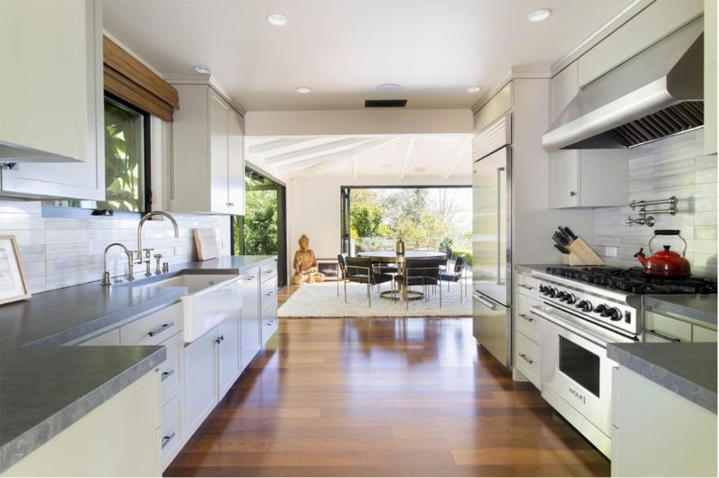 The kitchen opens onto the dining area. Photo: Sotheby's International Realty The kitchen opens onto the dining area. Photo: Sotheby's International Realty