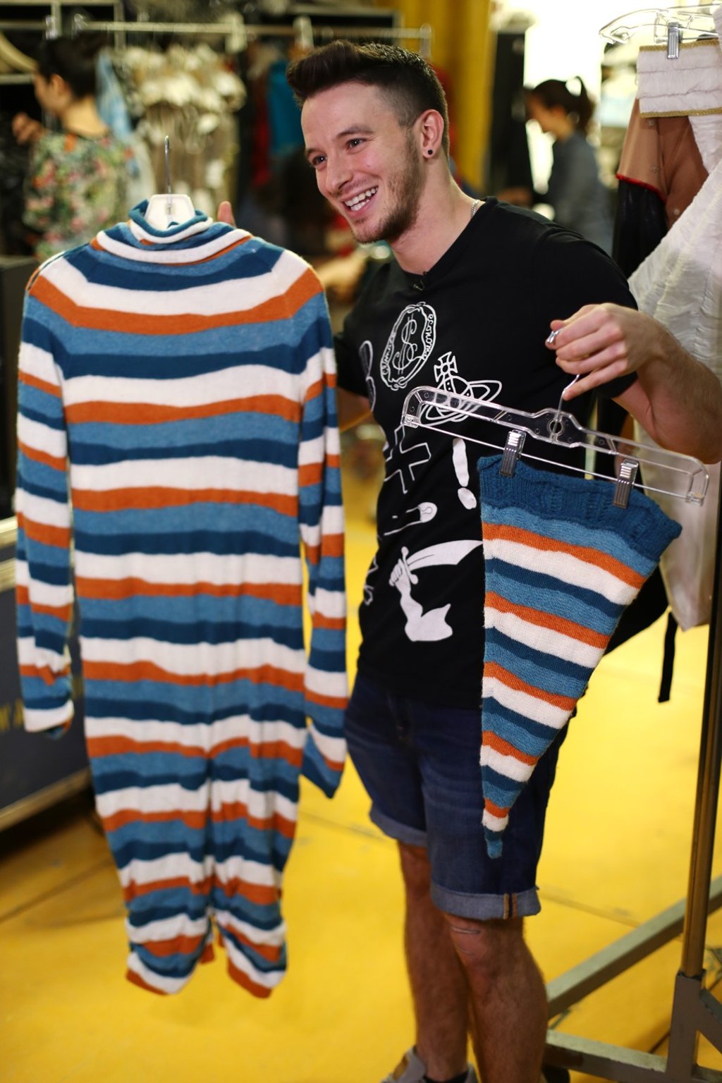 Cedric Belisle shows his costume backstage at Kooza in Central. Photo: Nora Tam