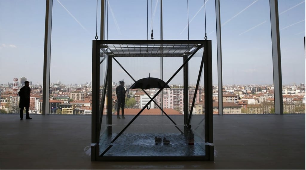 Damien Hirst’s installation ‘Tears for Everybody’s Looking at You’ – an umbrella and floating rubber ducks – on the eighth floor of Dutch architect Rem Koolhaas’ nine-storey tower built for the Prada Foundation in Milan. Photo: AP