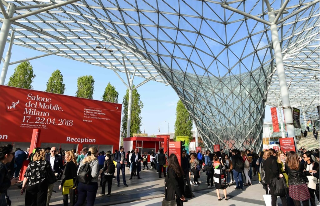 People arrive on the first day of the Salone del Mobile furniture fair in Milan on Tuesday. Photo: AFP People arrive on the first day of the Salone del Mobile furniture fair in Milan on Tuesday. Photo: AFP