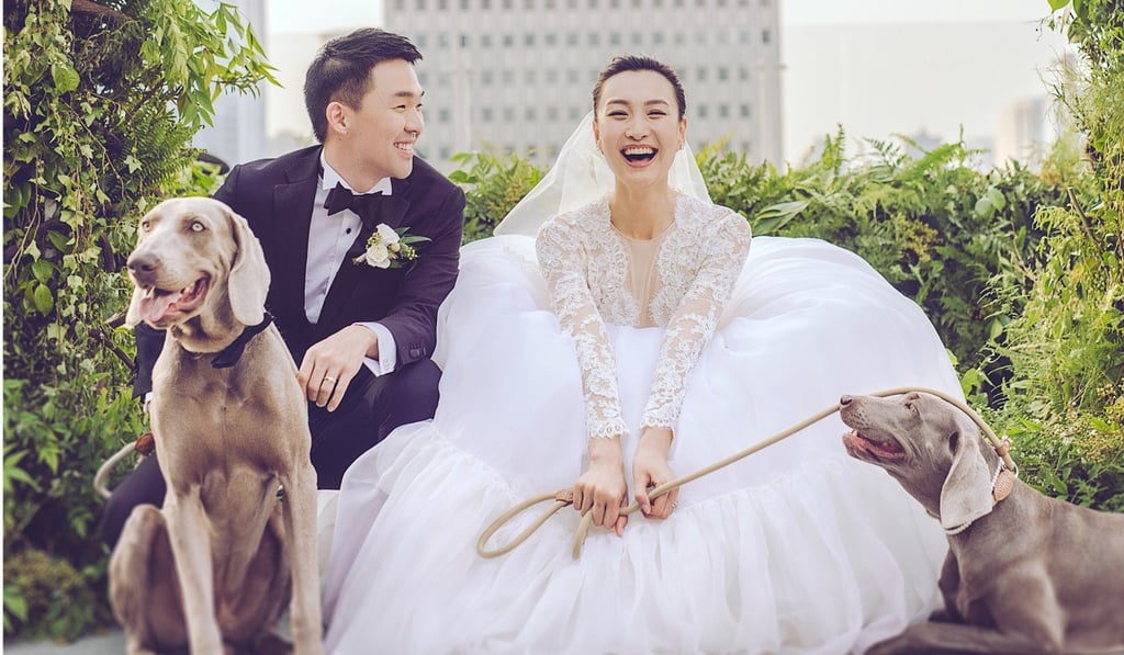 John and Sophia Liu at their wedding in Shanghai, with some special guests. John and Sophia Liu at their wedding in Shanghai, with some special guests.