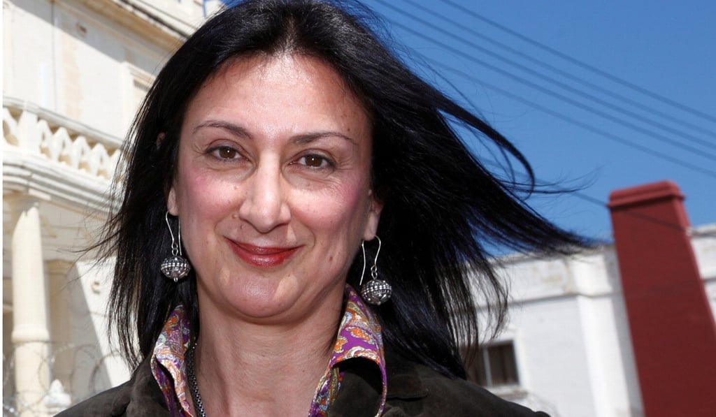 Maltese investigative journalist Daphne Caruana Galizia poses outside the Libyan Embassy in Balzan, Malta, on April 6, 2011. Photo: Reuters
