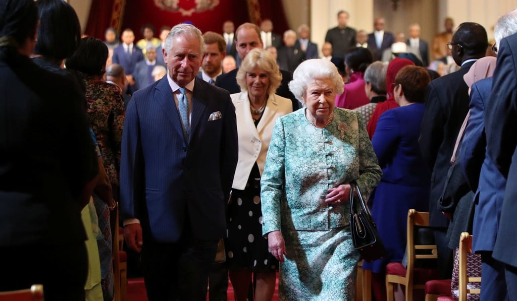 Prince Charles and Queen Elizabeth at the opening of the Commonwealth heads of government meeting on Thursday at Buckingham Palace in London. Photo: Reuters