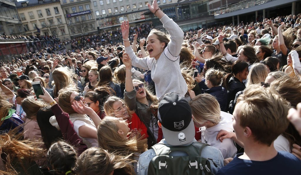 Fans gather to honour late Swedish DJ Avicii at Sergels torg in central Stockholm, Sweden on Saturday. Photo: EPA-EFE