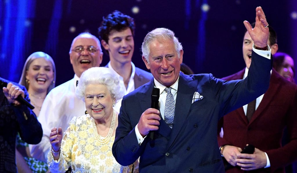 Queen Elizabeth and Prince Charles with the performers on stage at the Royal Albert Hall in London. Photo: AP