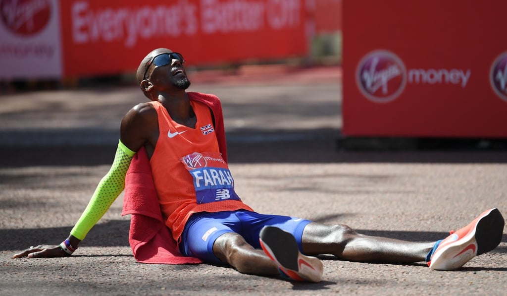 Britain's Mo Farrah takes a breather after finishing third in the race.