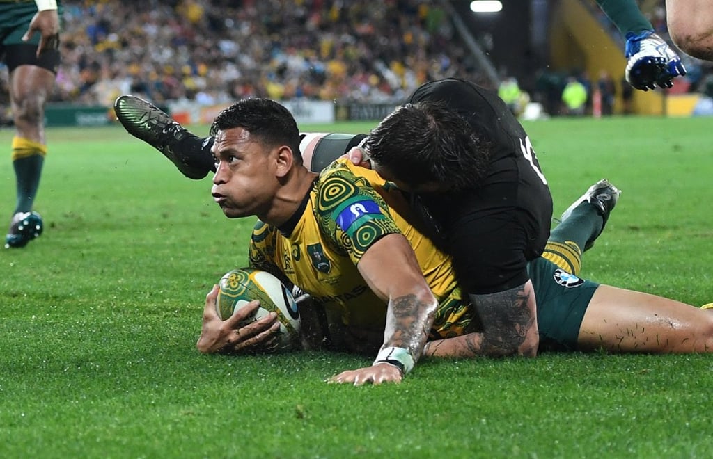 Israel Folau scores against the All Blacks. Photo: EPA