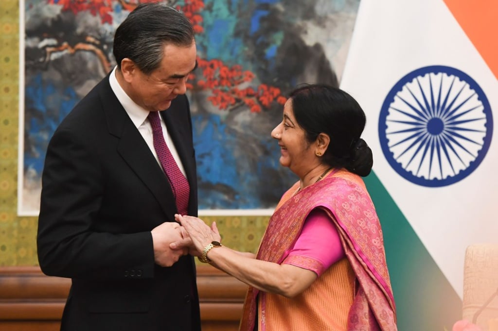 Indian External Affairs Minister Sushma Swaraj shakes hands with Chinese Foreign Minister Wang Yi in Beijing on Sunday. Photo: AFP Indian External Affairs Minister Sushma Swaraj shakes hands with Chinese Foreign Minister Wang Yi in Beijing on Sunday. Photo: AFP