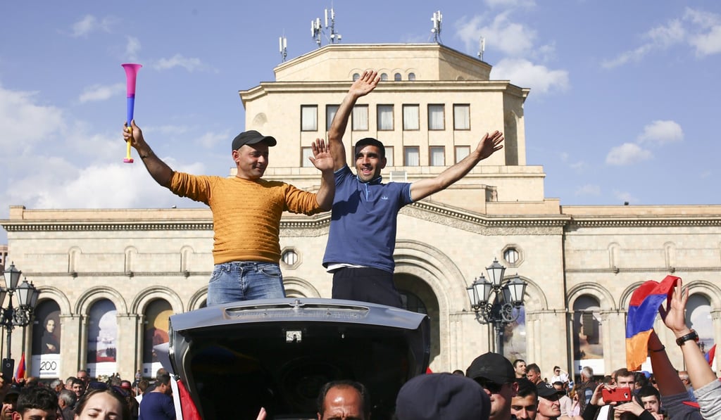 People celebrate Armenian Prime Minister's Serzh Sargsyan's resignation on Monday in Yerevan, Armenia. Photo: PAN Photo via AP