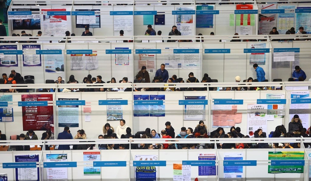 Jobseekers at a recruitment fair for graduates in Tianjin in  November 2017. It has become increasingly common for job postings to specify “men only” or “men preferred”. Photo: Xinhua