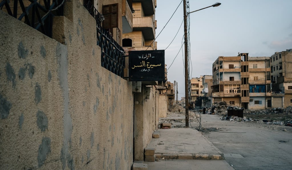 A sign outside Samira al-Nasr's her home in Raqqa reads: A sign outside Samira al-Nasr's her home in Raqqa reads: