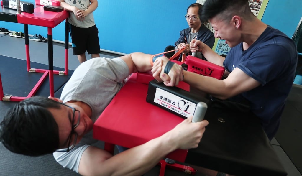 Tommy Kwong (left) and fellow association members put in a bit of training. Photo: Jonathan Wong