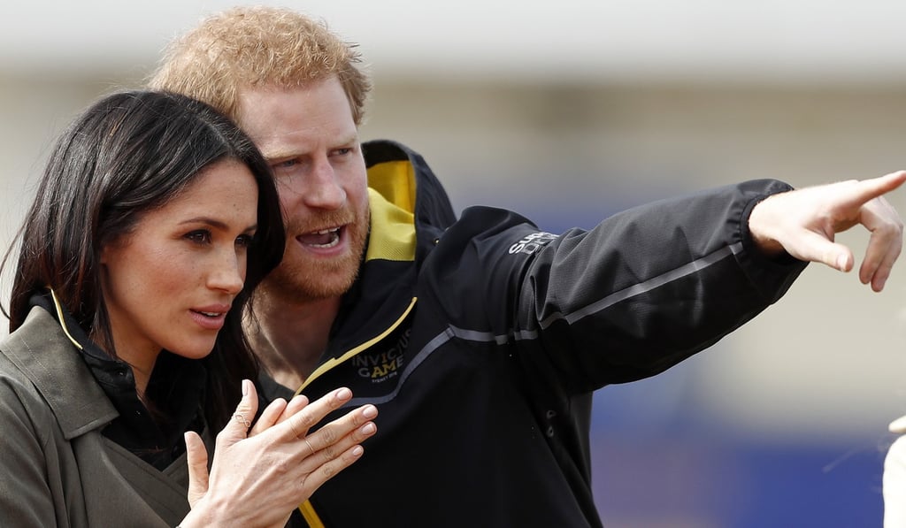 Britain's Prince Harry and his fiancée, Meghan Markle, attend the UK team trials for the Invictus Games Sydney 2018 at the University of Bath in Bath, England, on April 6. Photo: AP