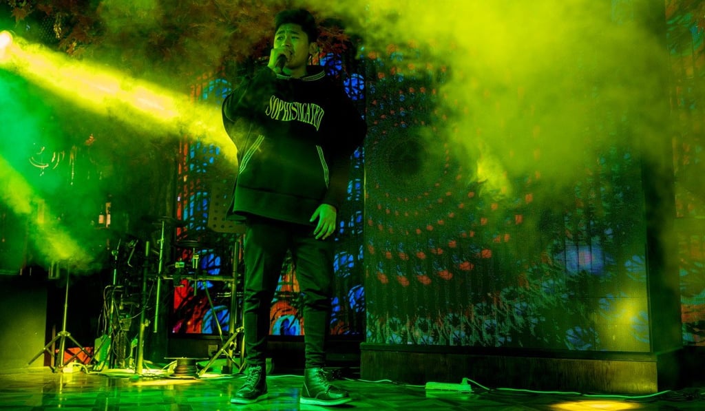 Sang-Sang, 21, sings at Jiesilin bar in Chengdu.