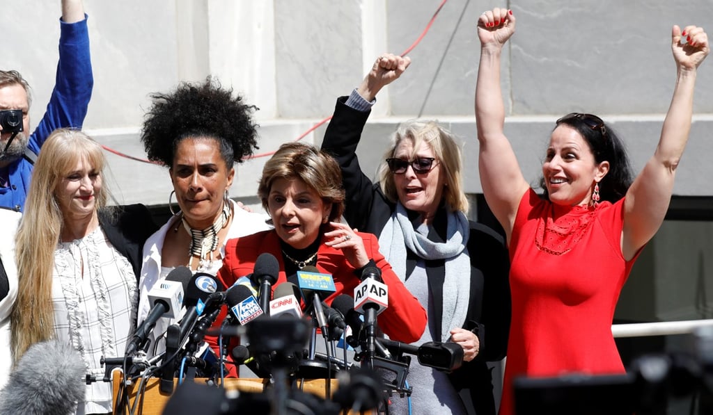 Lawyer Gloria Allred (at microphones) stands with accusers of actor and comedian Bill Cosby on Thursday after a jury convicted him in a sexual assault retrial in Norristown, Pennsylvania. Photo: Reuters