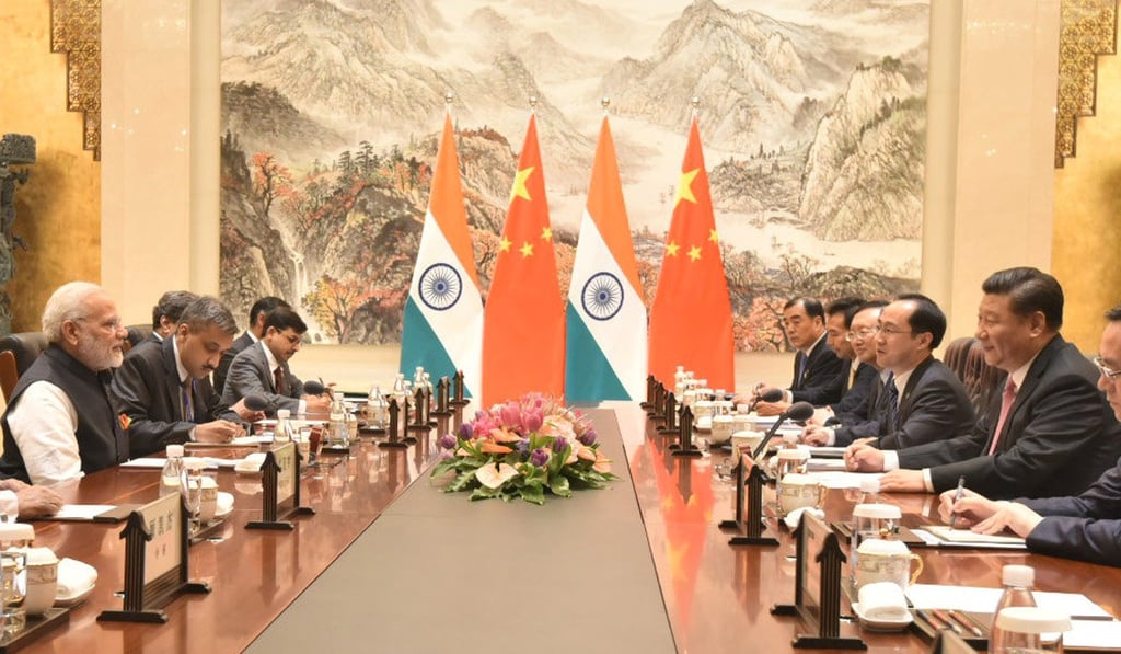 President Xi Jinping (far right) and Indian Prime Minister Narendra Modi (far left) attend a meeting at East Lake Guest House, in Wuhan. Photo: Reuters