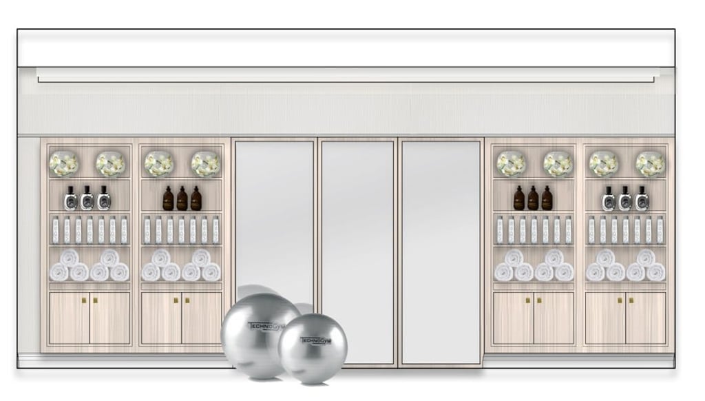 High-end sprung flooring features a timber-look plank design with inset matting and bronze trims.