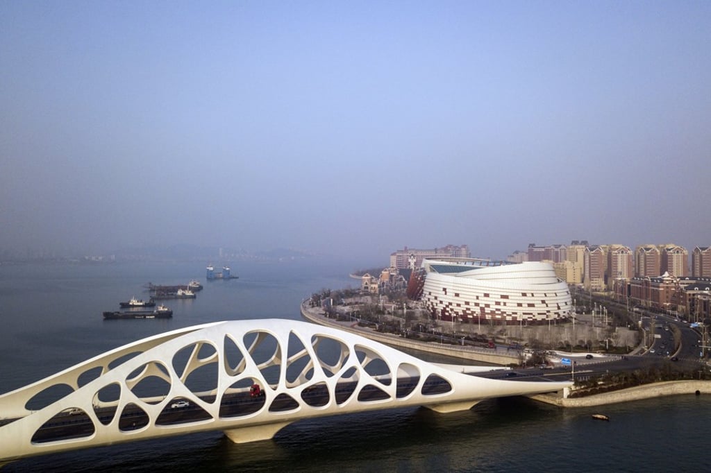 A bridge connecting Qingdao city with the Oriental Movie Metropolis film production hub in this aerial photograph taken on Tuesday, April 17, 2018. Photo: Bloomberg A bridge connecting Qingdao city with the Oriental Movie Metropolis film production hub in this aerial photograph taken on Tuesday, April 17, 2018. Photo: Bloomberg