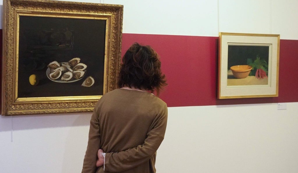 A visitor looks at paintings by Etienne Terrus at the museum. Photo: AFP A visitor looks at paintings by Etienne Terrus at the museum. Photo: AFP