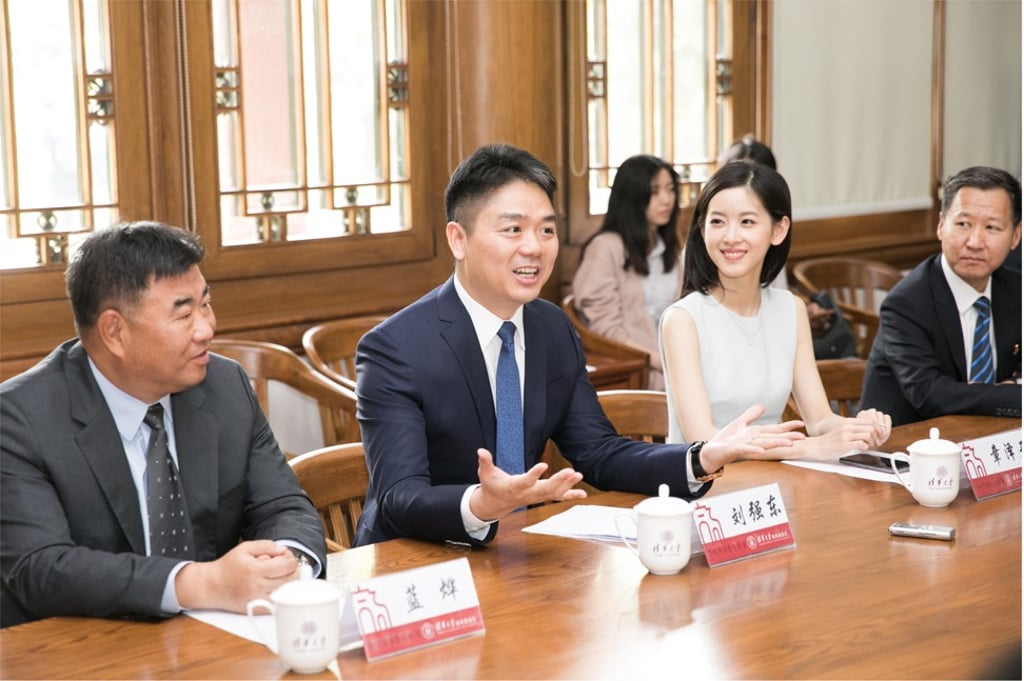 JD.com CEO Richard Liu and wife Zhang Zetian at a meeting in Tsinghua University.