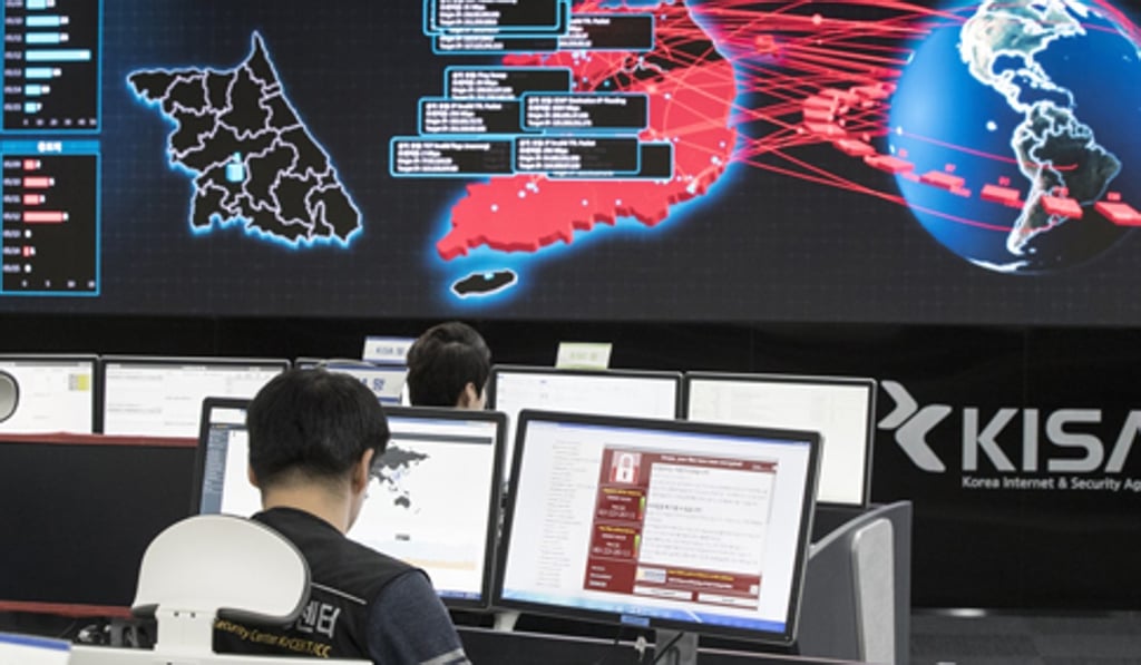 Employees watch electronic boards monitoring possible ransomware cyberattacks at the Korea Internet and Security Agency in Seoul, South Korea, in May 2017. South Korea has long braced itself for cyberattacks from North Korea. Photo: AP