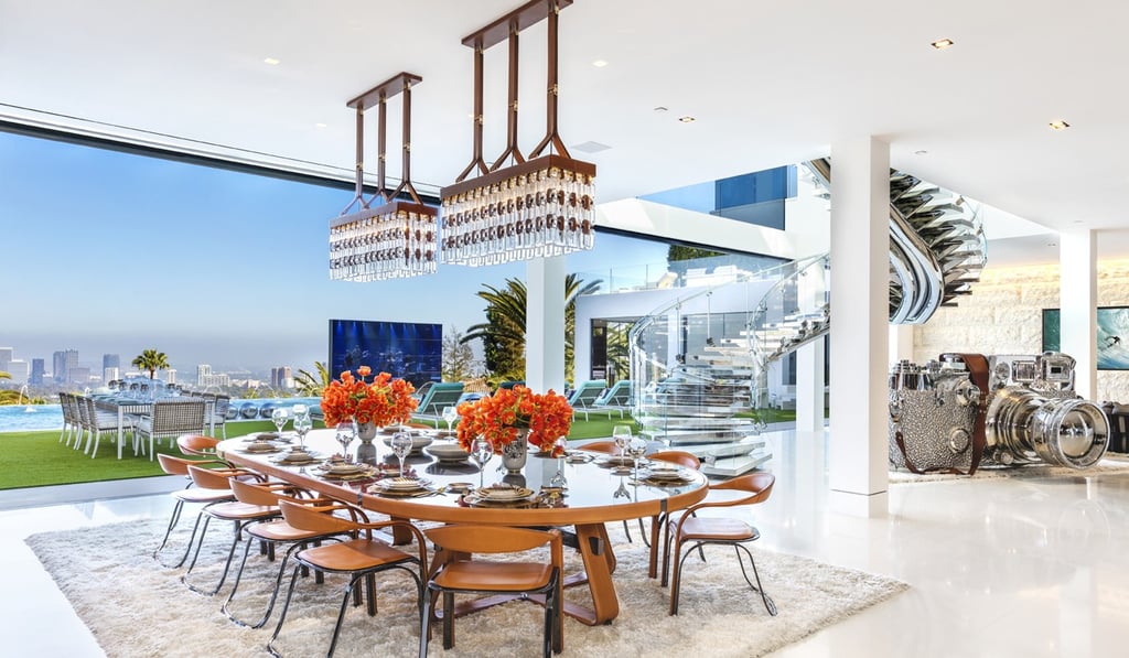 The dining room with alfresco extensions for an impromptu poolside party. Photo: Top Ten Estate Deals