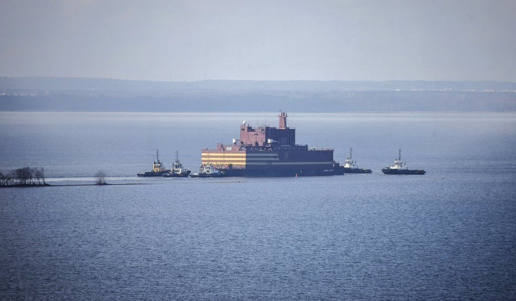 An undated handout photo made available by Greenpeace shows the Akademik Lomonosov, the world's first floating nuclear power station, under tow and leaving St Petersburg, Russia. Photo: EPA