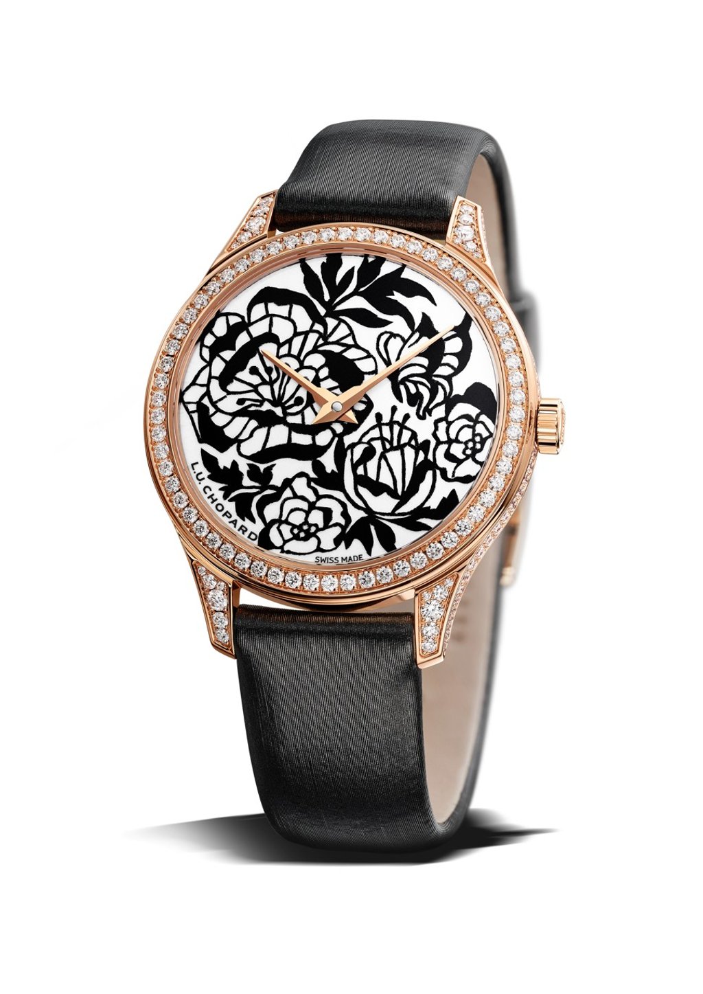 Chopard. The diamond-set L.U.C XP Esprit de Fleurier Peony watch in rose gold delicately depicts the flower through the art of paper cutting. Price on request