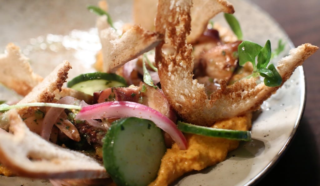 Octopus with roasted chickpeas and cured cucumber at Brut. Photo: Edmond So