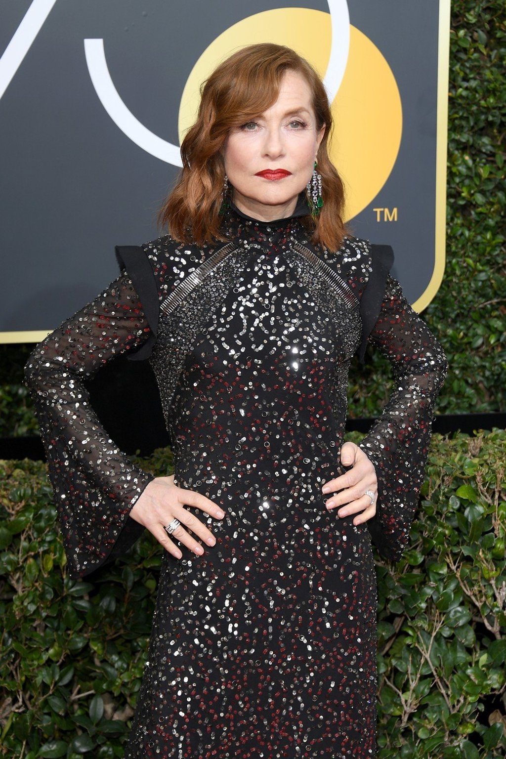 Isabelle Huppert wears 18ct white gold, diamond and emerald earrings from Chopard’s High Jewellery Collection featuring cushion-cut diamonds of 21.4ct to the 75th Annual Golden Globe Awards in California. Photo: Venturelli/WireImageunion