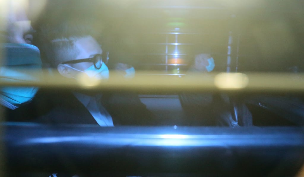 (From left) Yep Chi-fung and Mo Jia-Tao are escorted away by the Correctional Services Department from the West Kowloon Court. Photo: Dickson Lee