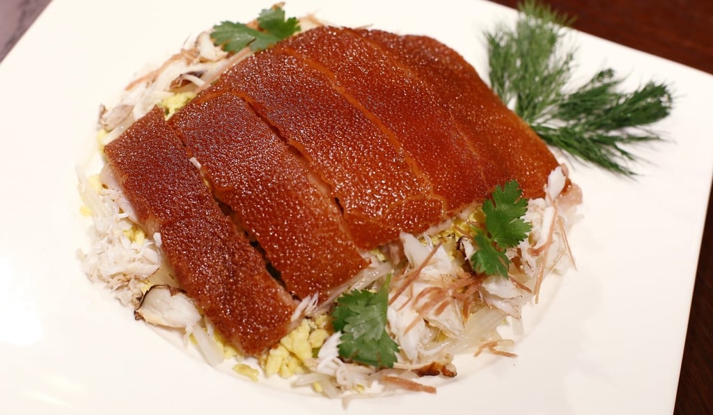 Stir-fried suckling pig with conpoy, bean sprouts and scrambled eggs. Photo: Edmond So