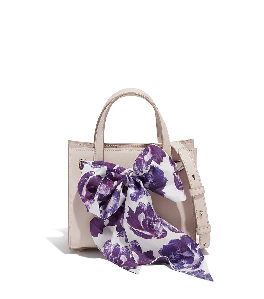 Salvatore Ferragamo. Embellished with an elegant floral printed silk detail, the Foulard Double Handle bag gives your style a revamp, HK$13,650