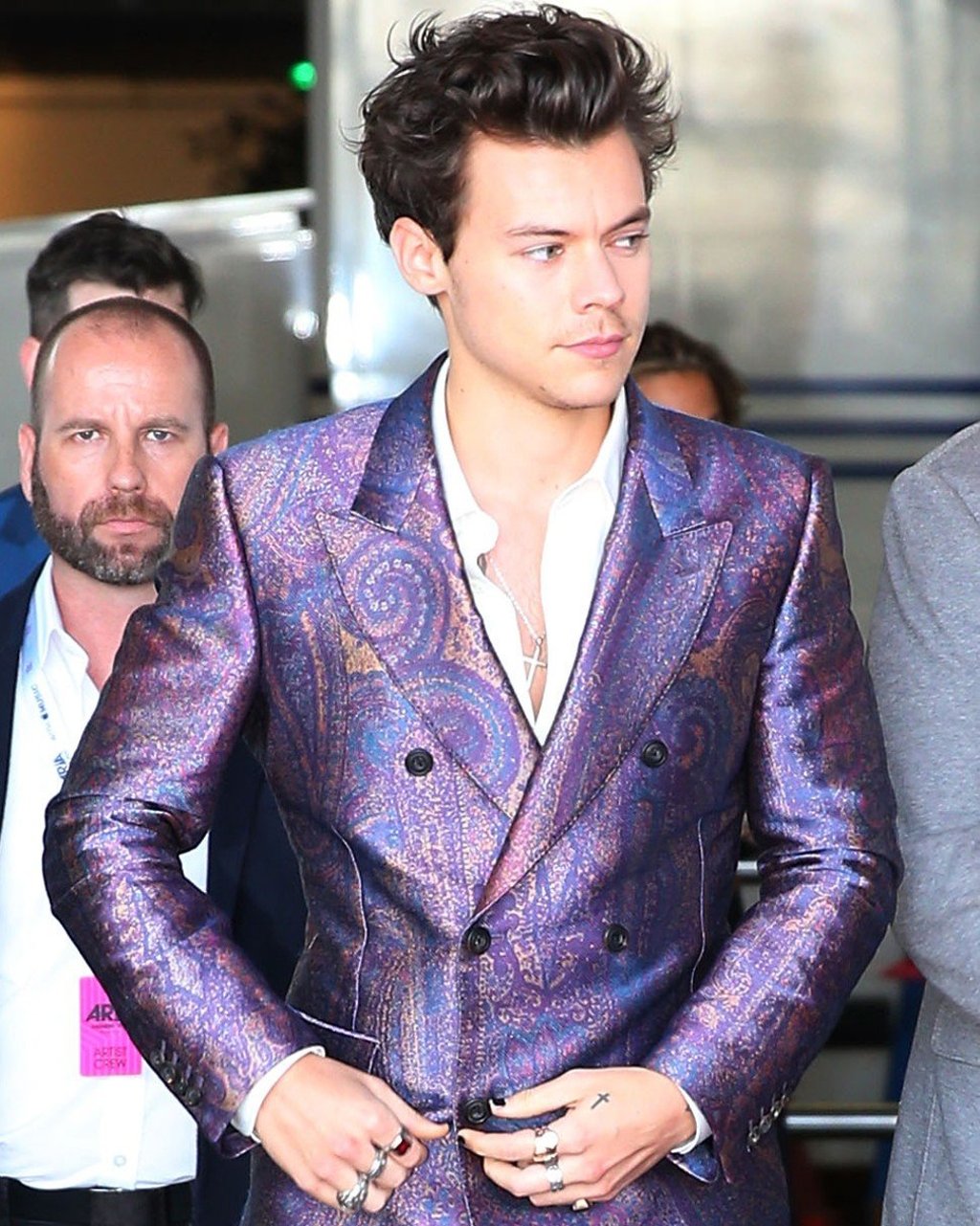 Styles in a bespoke paisley suit from Alexander McQueen in Sydney, Australia.