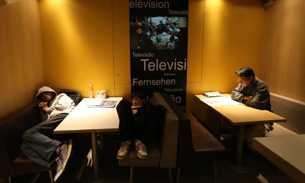 Some of Hong Kong’s homeless take shelter in a fast food fast restaurant in Mong Kok. Photo: Felix Wong