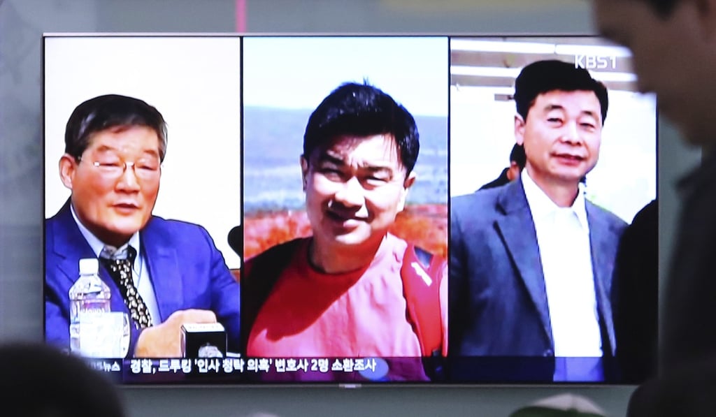 A televised report about the three Americans detained in North Korea - from left, Kim Dong-chul, Kim Sang-duk and Kim Hak-song - is seen at the Seoul Railway Station in Seoul, South Korea, on Thursday. Photo: AP A televised report about the three Americans detained in North Korea - from left, Kim Dong-chul, Kim Sang-duk and Kim Hak-song - is seen at the Seoul Railway Station in Seoul, South Korea, on Thursday. Photo: AP