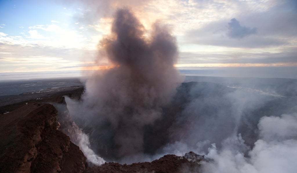 An aerial photo taken on Wednesday shows smoke rising from the Puu Oo crater of Kilauea on Hawaii. Photo: EPA
