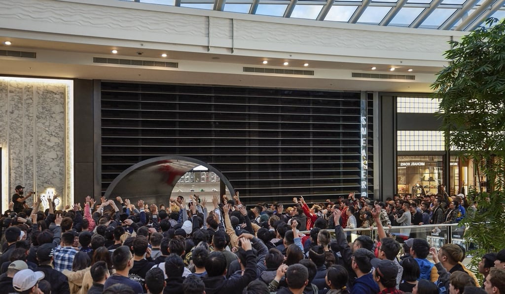 Crowds queue at Sneakerboy’s new store in Melbourne’s Chadstone Shopping Centre for its Yeezy 350 live ‘retro raffle’ in 2017. Crowds queue at Sneakerboy’s new store in Melbourne’s Chadstone Shopping Centre for its Yeezy 350 live ‘retro raffle’ in 2017.