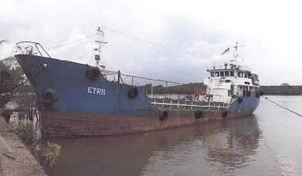 A rusty tanker near Kota Tinggi in Johor state, Malaysia. Malaysian police intercepted the tanker with more than 125 Sri Lankans believed bound for Australia and New Zealand on board. Photo: AP A rusty tanker near Kota Tinggi in Johor state, Malaysia. Malaysian police intercepted the tanker with more than 125 Sri Lankans believed bound for Australia and New Zealand on board. Photo: AP