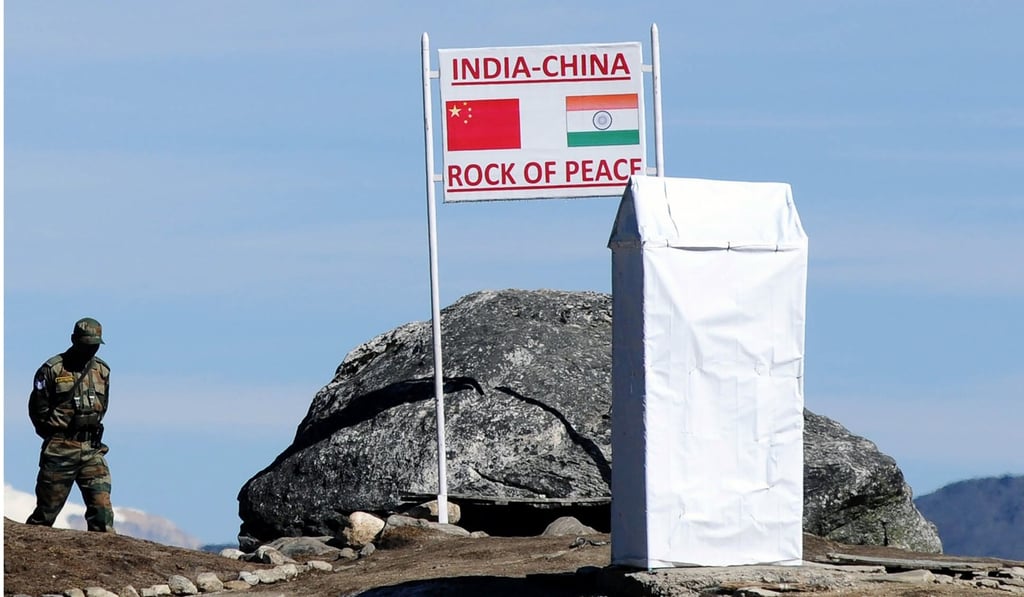 An Indian soldier keeps watch at Bumla Pass on the India-China border in Arunachal Pradesh. Photo: AFP
