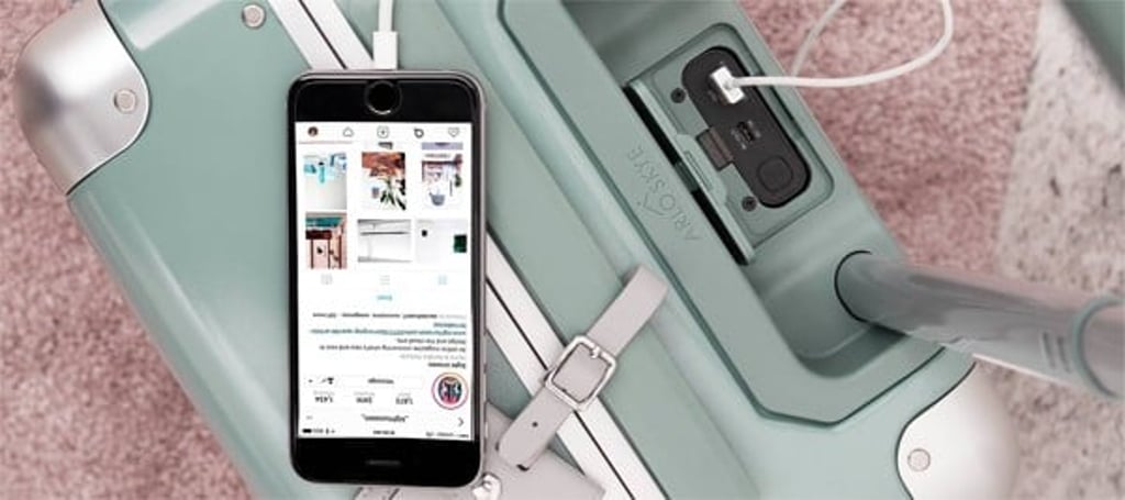 Arlo Skye’s Carry On travel bag offers charging ports for smartphones and Macbooks.