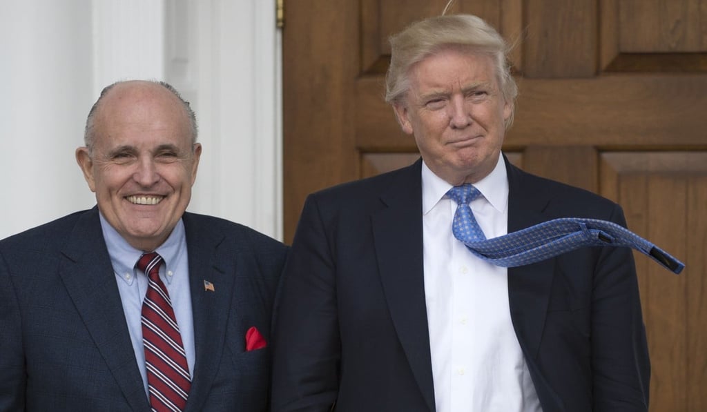 Donald Trump has begun questioning whether Rudy Giuliani, an old friend and former New York City mayor, should be sidelined from television interviews. File photo: AFP