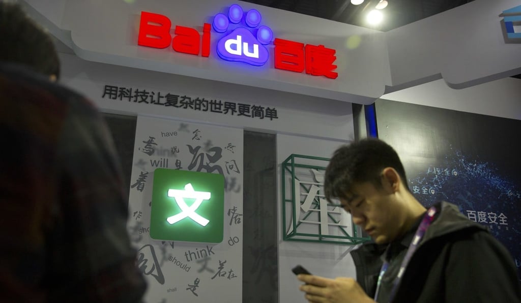 A man uses his smartphone at a booth for Baidu at the mobile conference in Beijing on April 26. Photo: AP A man uses his smartphone at a booth for Baidu at the mobile conference in Beijing on April 26. Photo: AP