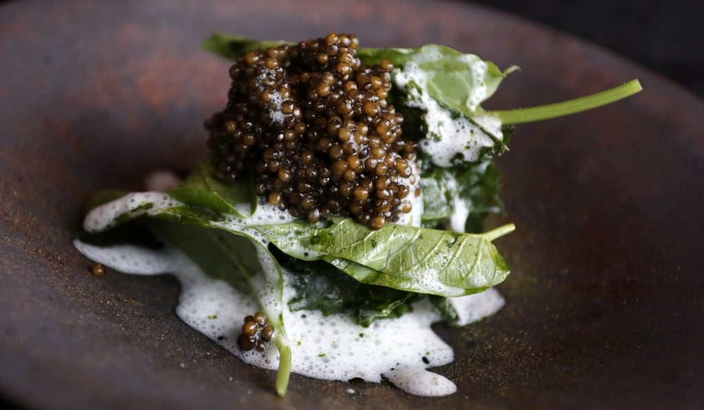 Royal schrenki caviar with bone marrow soufflé and basil sauce. Photo: Jonathan Wong