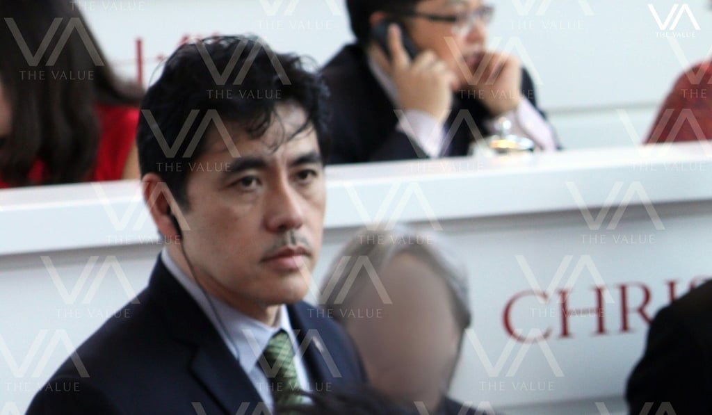 Jerry Chun Shing Lee is seen working as a security officer at a Christie’s event in Hong Kong. Photo: The Value.