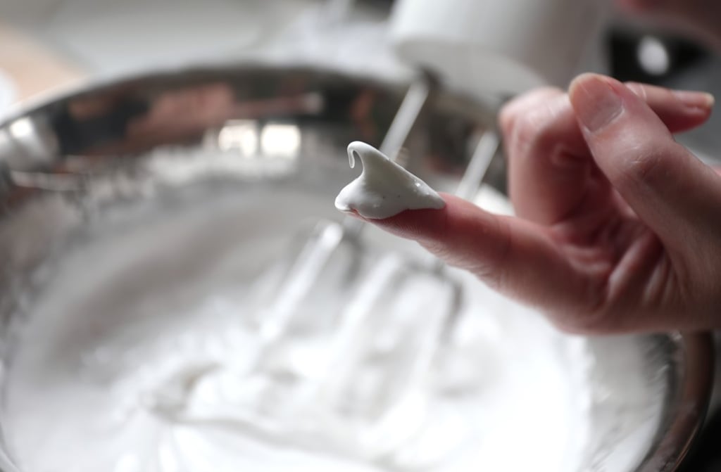 Whisk the egg whites, salt, sugar and cornstarch to make the meringues.