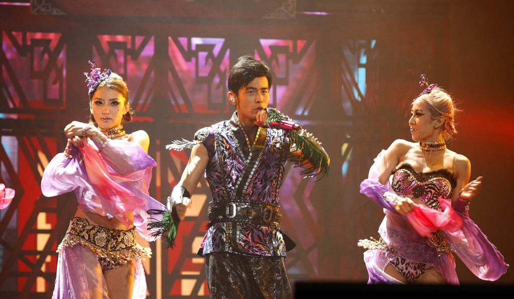 Jay Chou (centre) during a performance in Hong Kong in 2014. Photo: SCMP Pictures Jay Chou (centre) during a performance in Hong Kong in 2014. Photo: SCMP Pictures