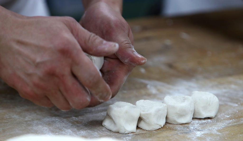 Chef Leo Tse cuts the dough into two-inch pieces. Photo: Winson Wong